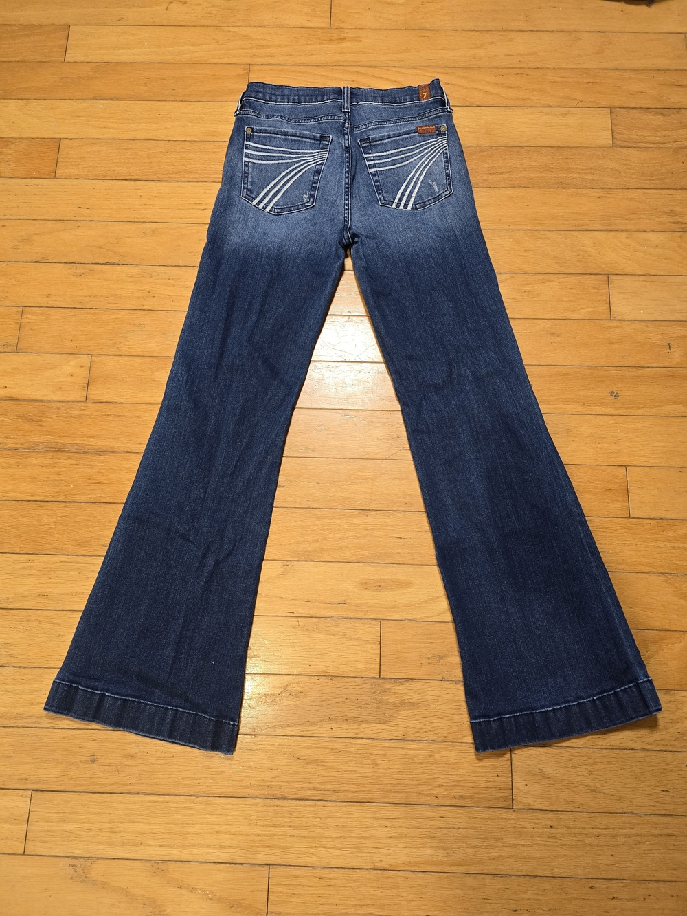 7 For All Mankind Dark Blue Flare Jeans with Contrast Back Stitching